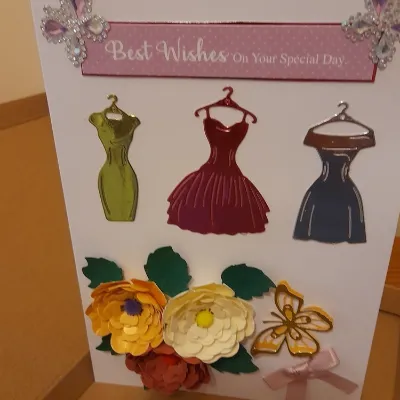 Dresses And Flowers Best Wishes Card. 1