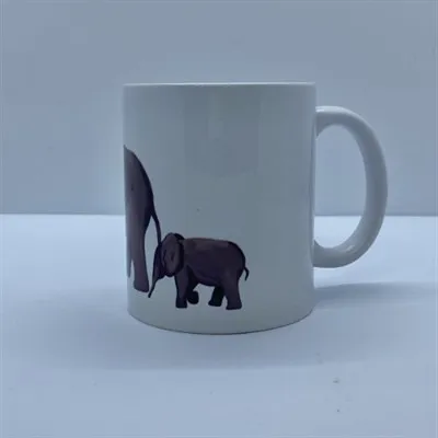 Elephant mug, mom and baby, view with handle on right side.