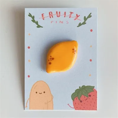 Lemon lapel pin