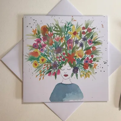 Flowers in her hair Greetings Card