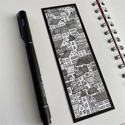 Pen illustrated bookmark with repeating town pattern