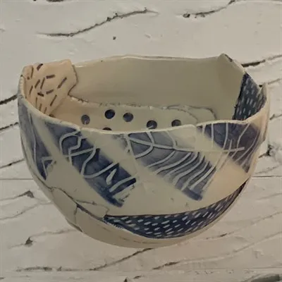 Handmade ceramic blue bowl side 1