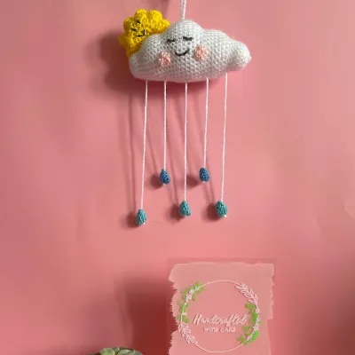 Handmade crochet rain cloud wall hanging 1