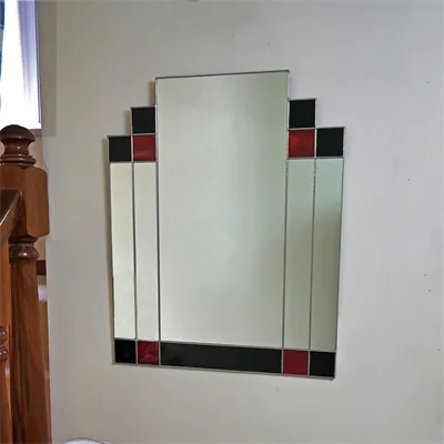 Rectangular Art Deco wall mirror in black and red stained glass