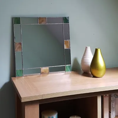 Small Art Deco mirror in brown and green stained glass