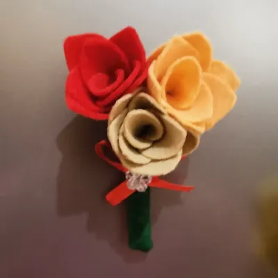 This lovely Handmade felt flower fridge  2