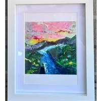 A print of a mountainscape painting