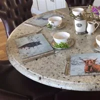 On Marble table in situ, Animal & Criccieth Castle Placemats