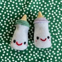 Baby bottle rattle