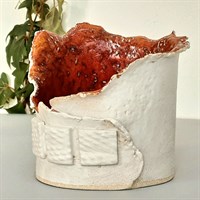 Burnt orange ceramic candle holder