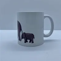 Elephant mug, mom and baby, view with handle on right side. gallery shot 6