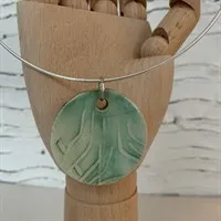 Handmade ceramic necklace close up