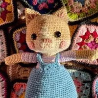 Kitty With A Pinafore