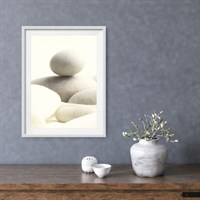 Photographic Art Print 'Serene Pebbles' shown framed in a room setting