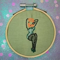 Pin up girl in green gallery shot 1