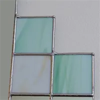 Art Deco wall mirror in green and cream stained glass