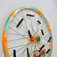 Repurposed bike wheel photo display gallery shot 5