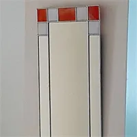 Small Art Deco rectangular wall mirror with orange and cream stained glass