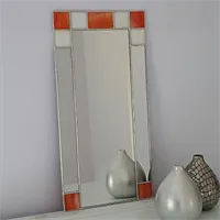 Small Art Deco rectangular mirror in orange/cream stained glass