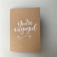 You're Engaged! on recycled brown card